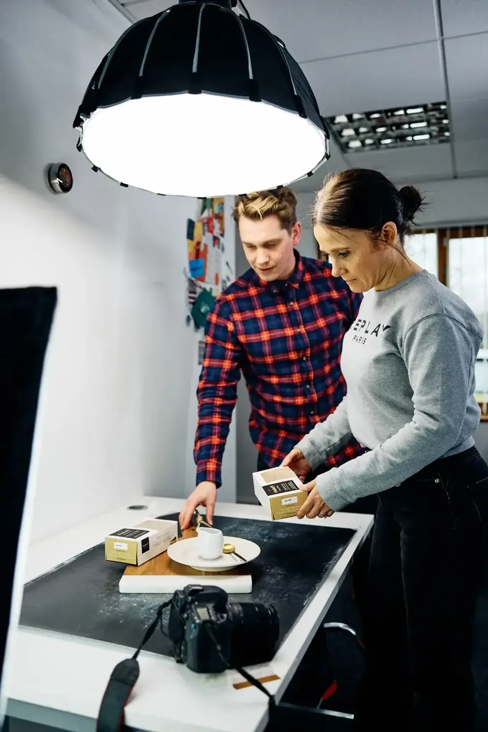 Tann Westlake team styling and photographing Rhokett products under studio lighting